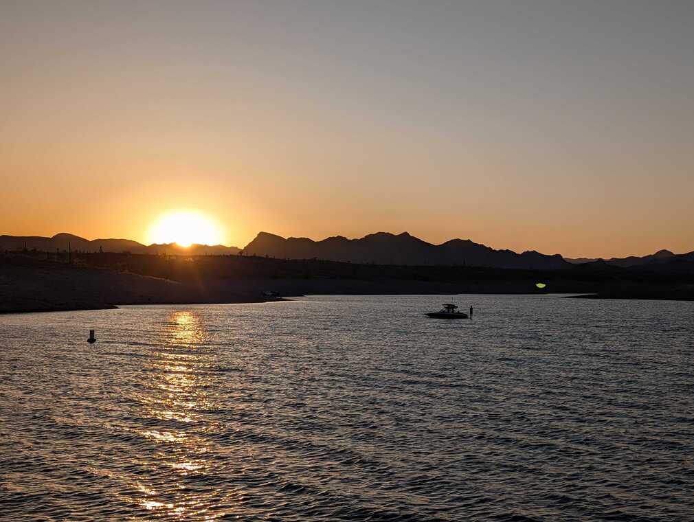 Desert Sunset Over Calm Water