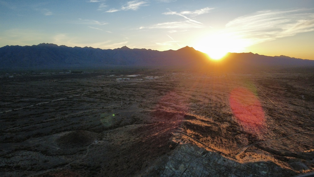 Desert Sunset Over Mountains