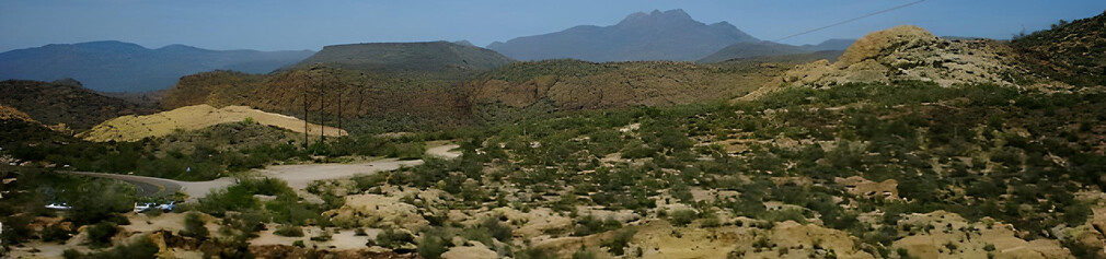 Desert Road Through Rocky Terrain